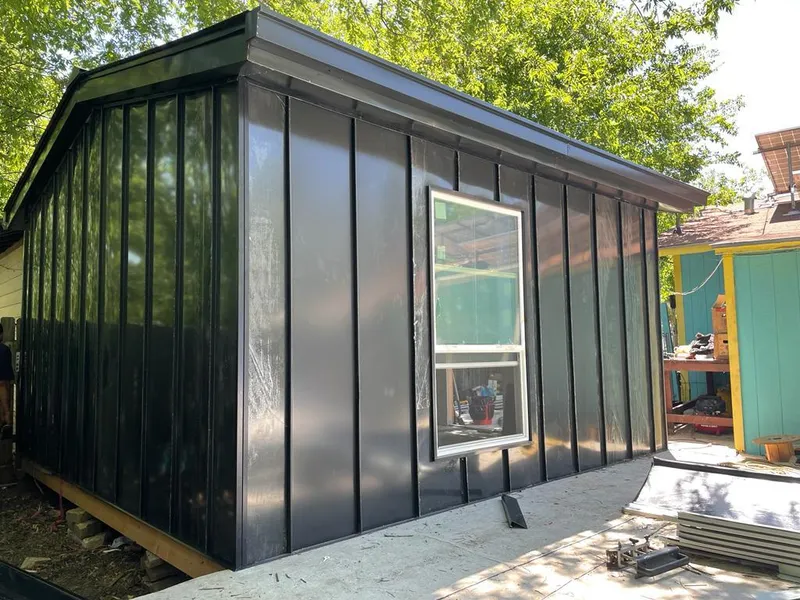 Black standing seam metal wall panels for Metal Roof Installation in Manvel