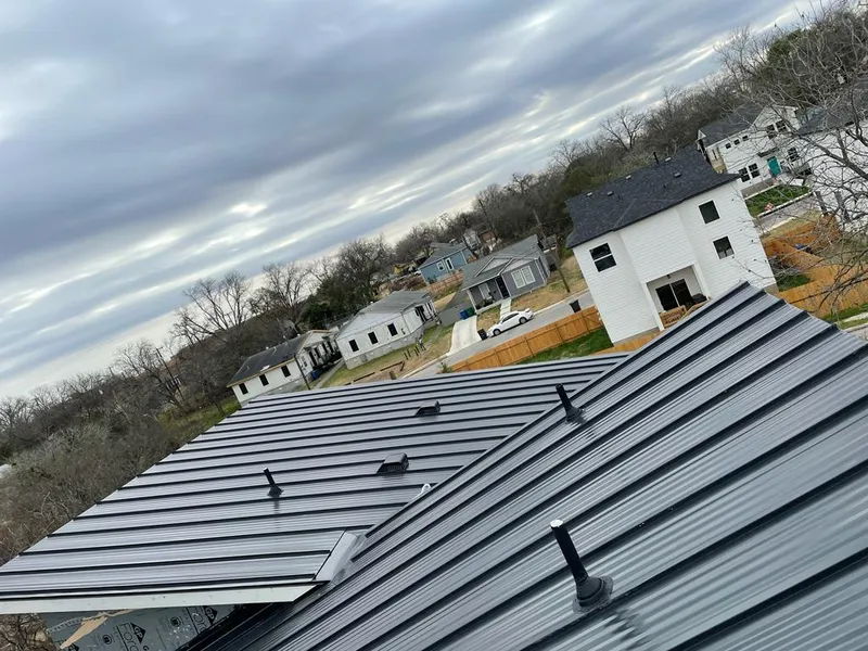 Standing seam metal roof panels with vents for Skylight Repair in Manvel